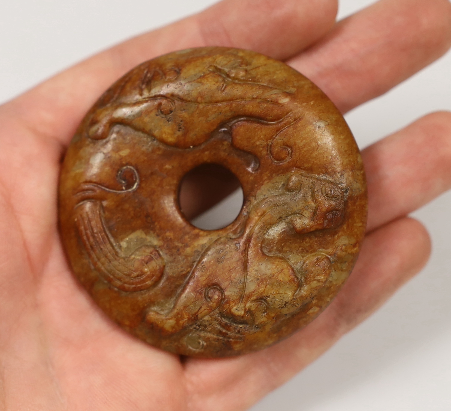 A collection of 10 various Chinese jade/hardstone carvings
